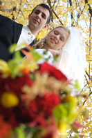 Bride and Groom with Wedding Flowers