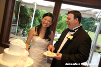 Bride and Groom with wedding cake