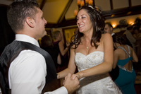 Groom dancing at wedding reception